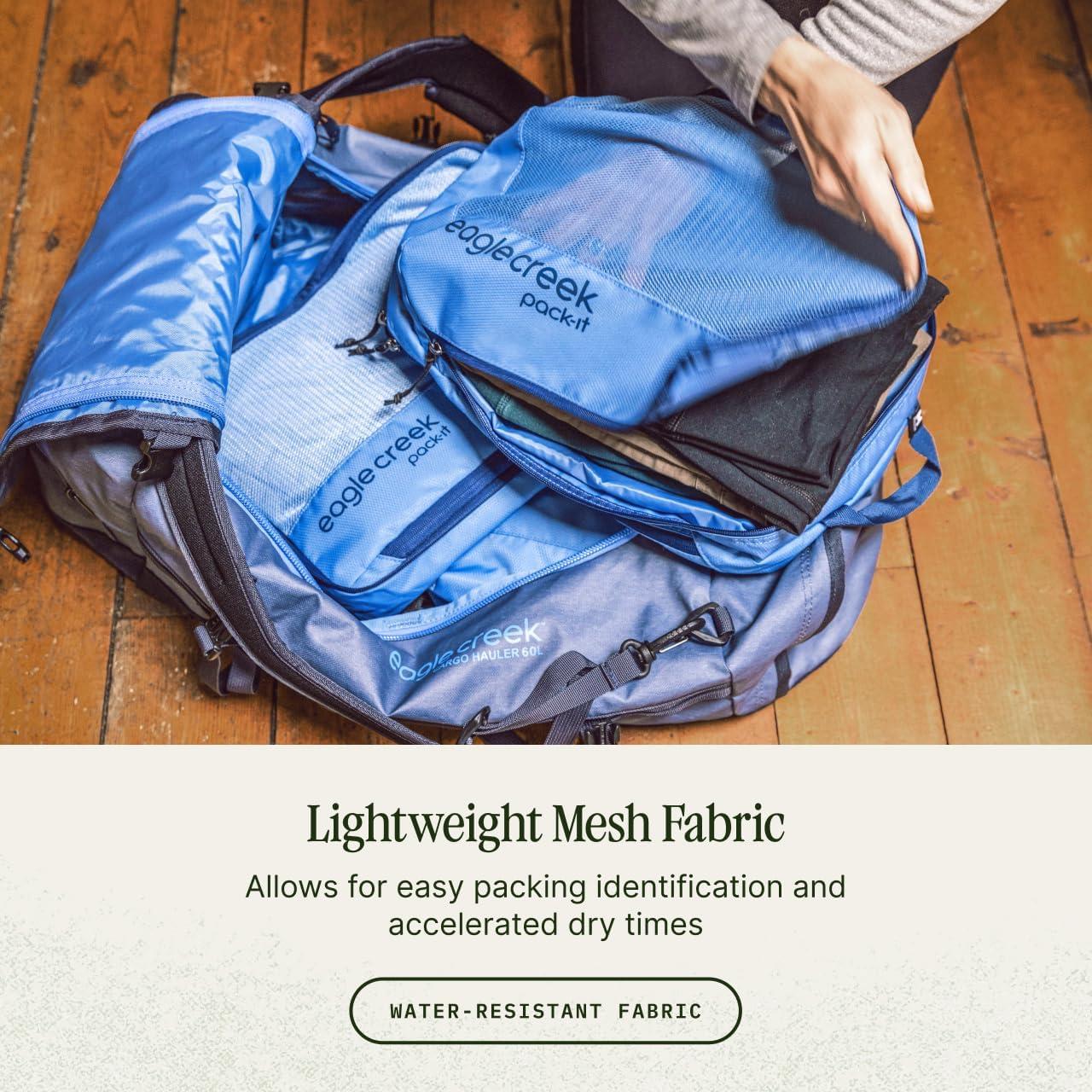 imageEagle Creek PackIt Isolate Compression Cube Lightweight Compression Cube for Optimizing Luggage Space EasyGrab Zipper Convenient Top Handle Recycled Materials MediumBlue Dawn Reveal New