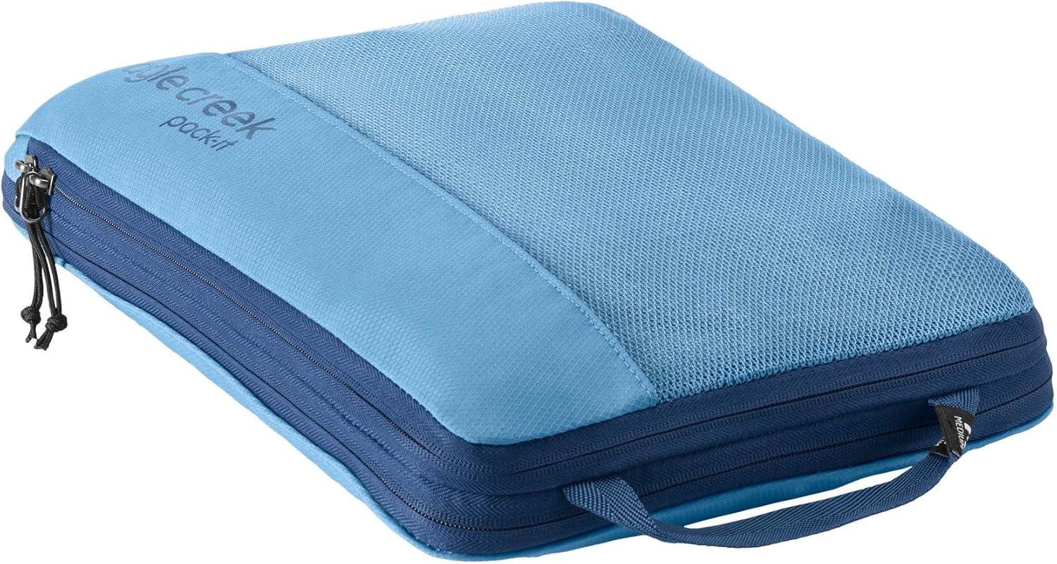 imageEagle Creek PackIt Isolate Compression Cube Lightweight Compression Cube for Optimizing Luggage Space EasyGrab Zipper Convenient Top Handle Recycled Materials MediumBlue Dawn Reveal New