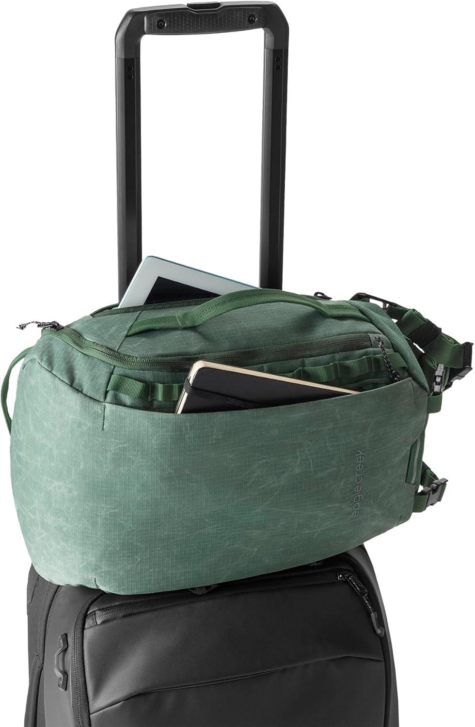 imageeagle creek Explore Sling Pack Compact Crossbody Sling Bag With Cushioned Back Panel Reinforced Side Grab Handle ampamp Stretchy Mesh Side Pockets Travel Accessories BlackGrass Green